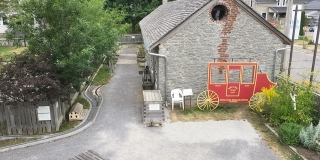 View of Exhibit Hall and Railway route taken from the Cottage